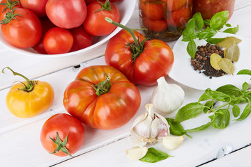 Fototapeta na wymiar Tomatoes in jars from organic farming.