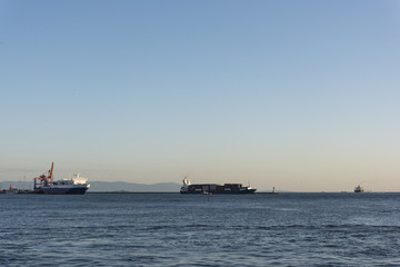 Fototapeta premium Ships on Istanbul Bosphorus at sunset time
