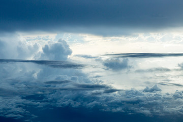 Obraz premium Clouds seen from the flight deck of an airplane