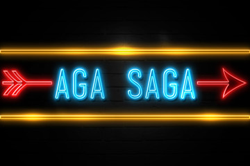 Aga Saga  - fluorescent Neon Sign on brickwall Front view