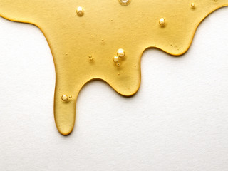 Close up of honey dripping