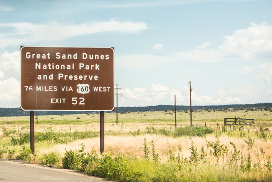 Road Sign For Great Sand Dunes National Preserve