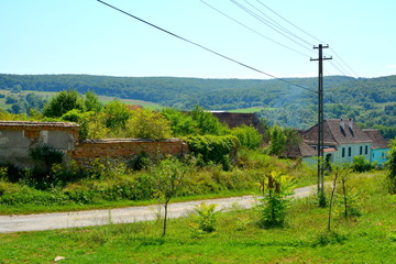 Typical rural landscape and peasant houses in  the village Somartin, Martinsberg, M&auml;rtelsberg, Transylvania, Romania. The settlement was founded by the Saxon colonists.