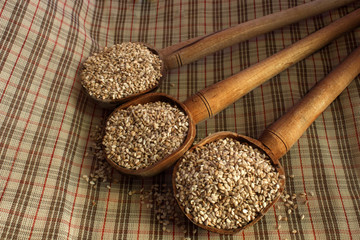 Food photography. Sesame seeds on a set of mexican wood spoons
