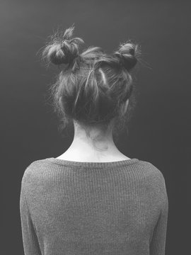 Portrait of thirteen year old girl looking away from camera