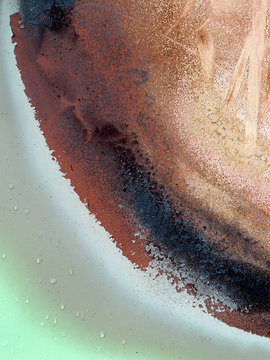 Detail of rust and scratch marks on metal trash canister