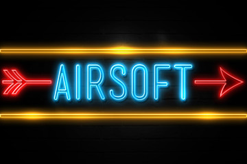 Airsoft  - fluorescent Neon Sign on brickwall Front view