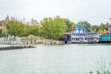 Fototapeta na wymiar lake with boat on sunny day