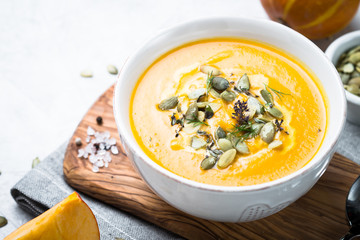 Pumpkin and carrot cream soup.