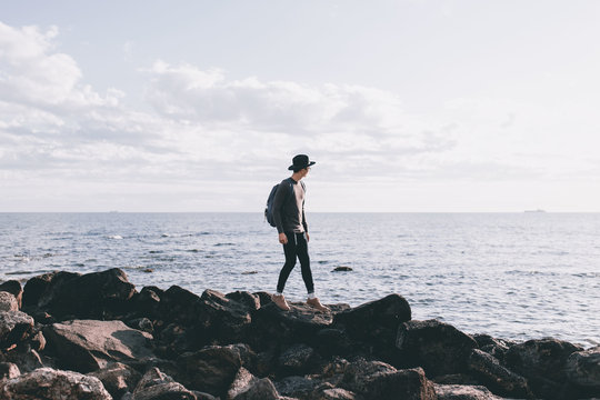 Young Man Exploring The Beach In Australia