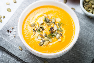 Pumpkin and carrot cream soup.