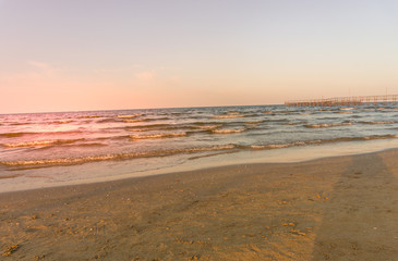 Fototapeta na wymiar beach and sea at sunset, summer vacation at the sea