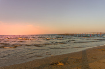 Fototapeta premium beach and sea at sunset, summer vacation at the sea