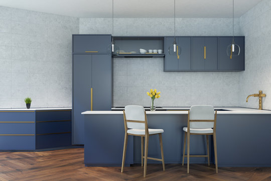 Gray and blue kitchen with a bar