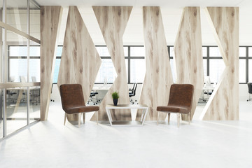 Brown armchairs waiting area, wood