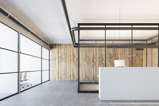 Wooden office with a white reception, closeup
