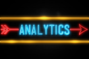 Analytics  - fluorescent Neon Sign on brickwall Front view