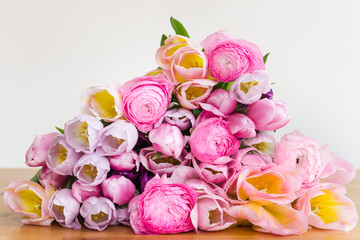 Bunch of Colorful Tulips and Pink Ranunculus Buttercup Flowers