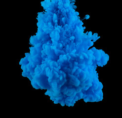 The cloud of blue paint in the dark water.
