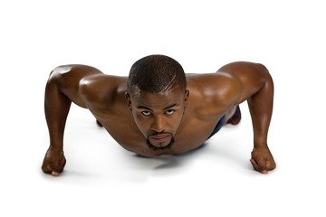 Portrait of sportsman practicing push ups