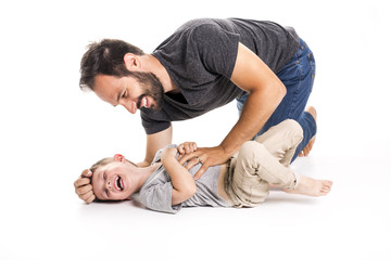 Father and son having fun over white background