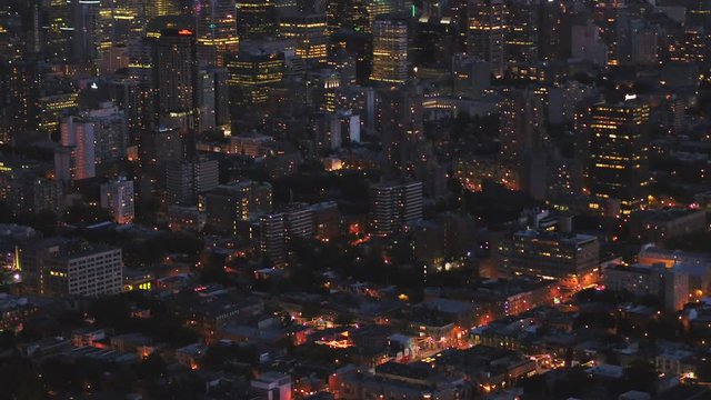 Montreal Quebec Aerial v27 Flying low over downtown at dusk panning down