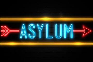 Asylum  - fluorescent Neon Sign on brickwall Front view