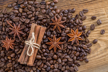 Background texture of grains of coffee cinnamon and anise stars