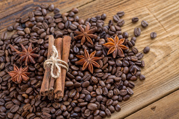 Background texture of grains of coffee cinnamon and anise stars