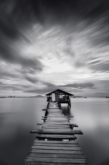 Obraz premium Sunrise at Dove Jetty. The Jelutong Fishermen Wharf is one of the makeshift piers along the coast in Jelutong, Penang. It is often called 