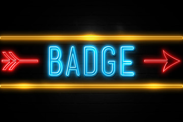 Badge  - fluorescent Neon Sign on brickwall Front view