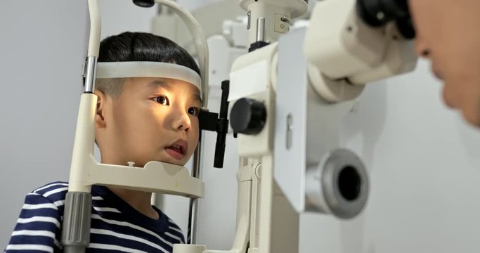 Little boy having eye test in the clinic