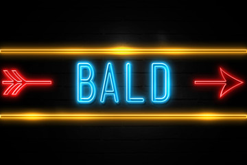 Bald  - fluorescent Neon Sign on brickwall Front view