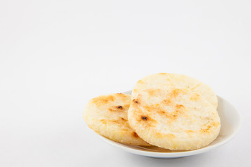 Roasted traditional Colombian white corn arepa