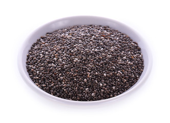 Chia seeds in bowl, isolated on white background.