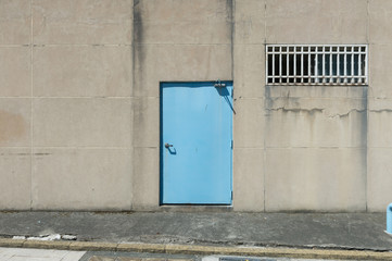 sidewalk by street wall & door