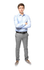 Cute teenager boy posing on white background