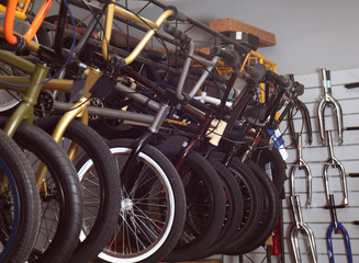 Stand with new bicycles in shop