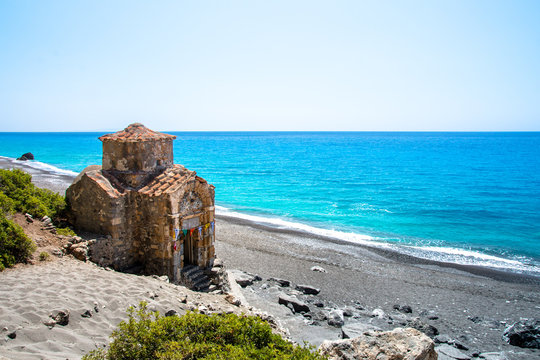 Agios Pavlos beach with Saint Paul church, a very old Byzantine church that was built at the place Selouda, an incredible beach at Opiso Egiali area.