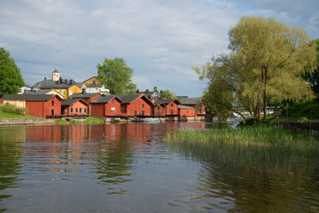 Obraz premium A cloudy June day on the Porvojoki river. Old Porvoo, Finland