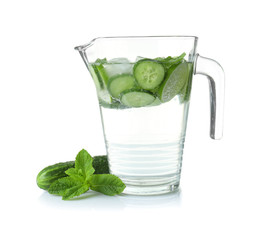 Delicious refreshing water with mint and cucumber in jug on white background