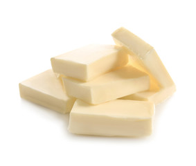 Cut block of butter isolated on white