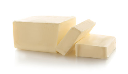 Cut block of butter isolated on white