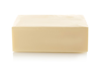 Whole block of butter isolated on white