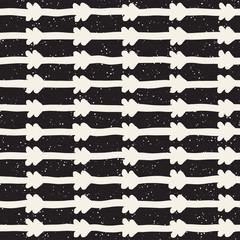 Hand drawn style ethnic seamless pattern. Abstract geometric tiling background in black and white. Vector freehand doodle texture.