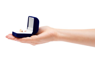 gift box with ring in hand isolated on white background