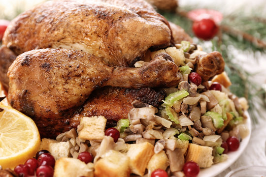Roasted turkey with stuffing served on holiday table