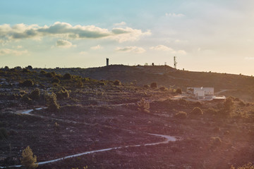 Military base at the mountain at sunset time, Israel, Samaria