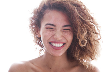 Smiling young woman with freckles