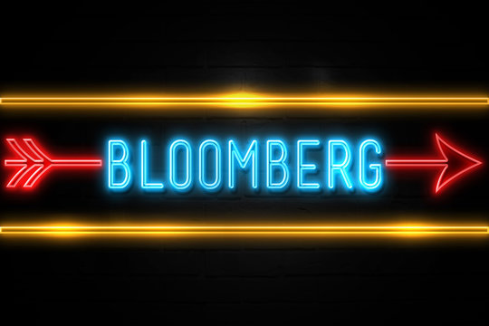 Bloomberg  - fluorescent Neon Sign on brickwall Front view